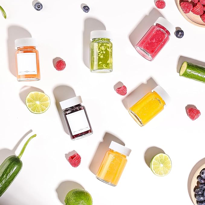 16 Pack 2 oz Glass Shot Bottles with White Caps & Labels, Wide Mouth 60 ml Clear Little Glass Jars for Ginger, Leakproof Travel Mini Jars for Wellness Shot, Juice - Dishwasher Safe