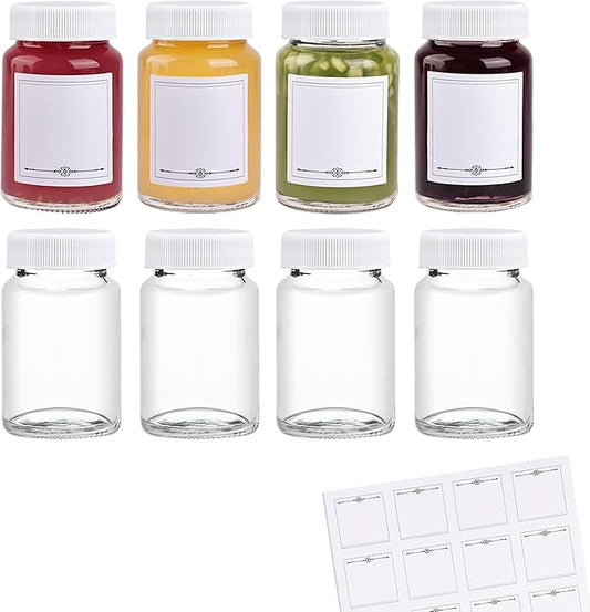 8 Pack, 2 oz Glass Shot Bottles w/White Caps & Labels - Small Clear Jar for Ginger, Wellness Shot, Juice, Sample, Whiskey - Travel Essentials Mini Bottles - Wide Mouth, Leakproof, Dishwasher Safe